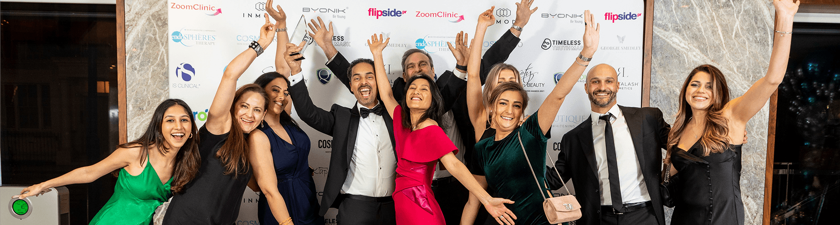 Dr De Silva at awards ceremony with colleagues