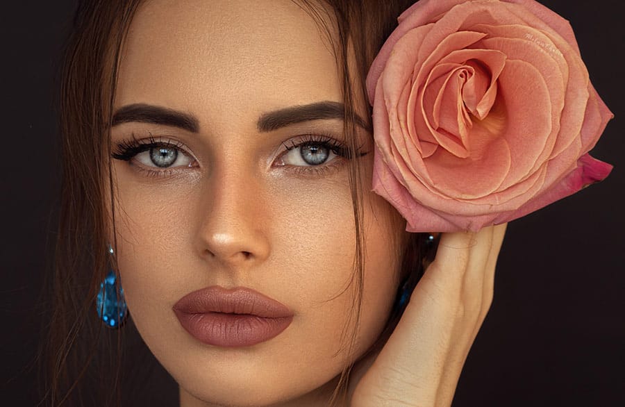 What Happens Before a Mini Facelift — female face with rose